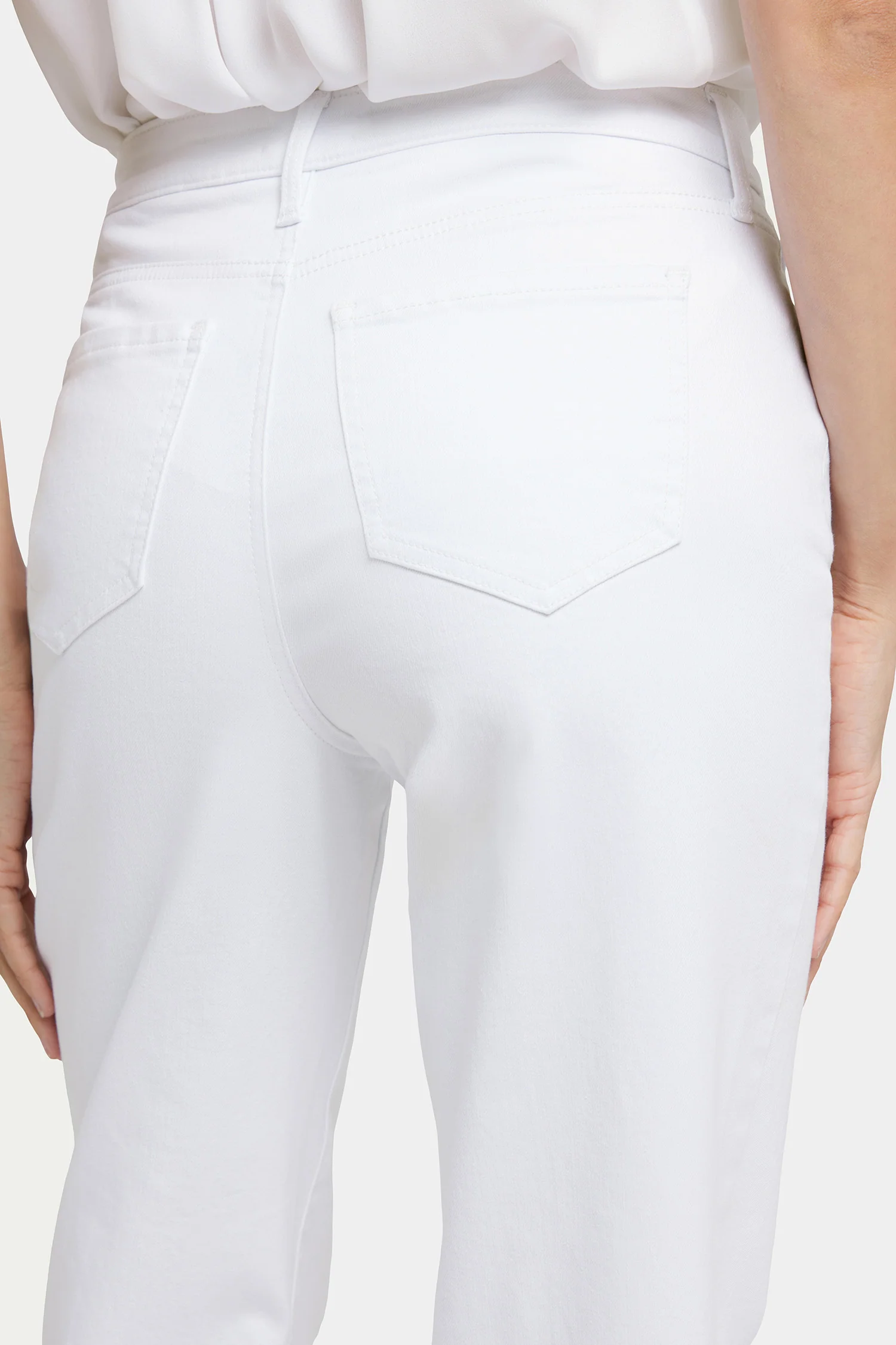10018-bailey-relaxed-straight-ankle-jeans-in-petite-optic-white-1.webp