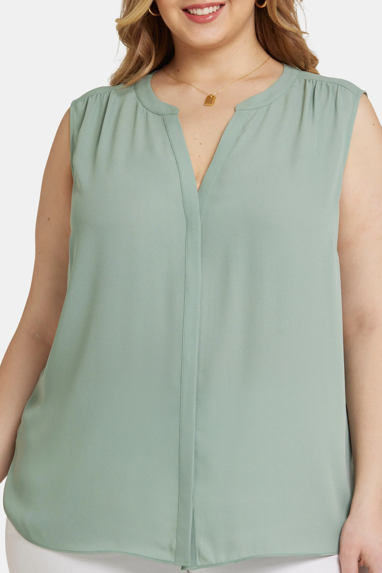 12089-sleeveless-pintuck-blouse-in-plus-size-lily-pad-1.webp
