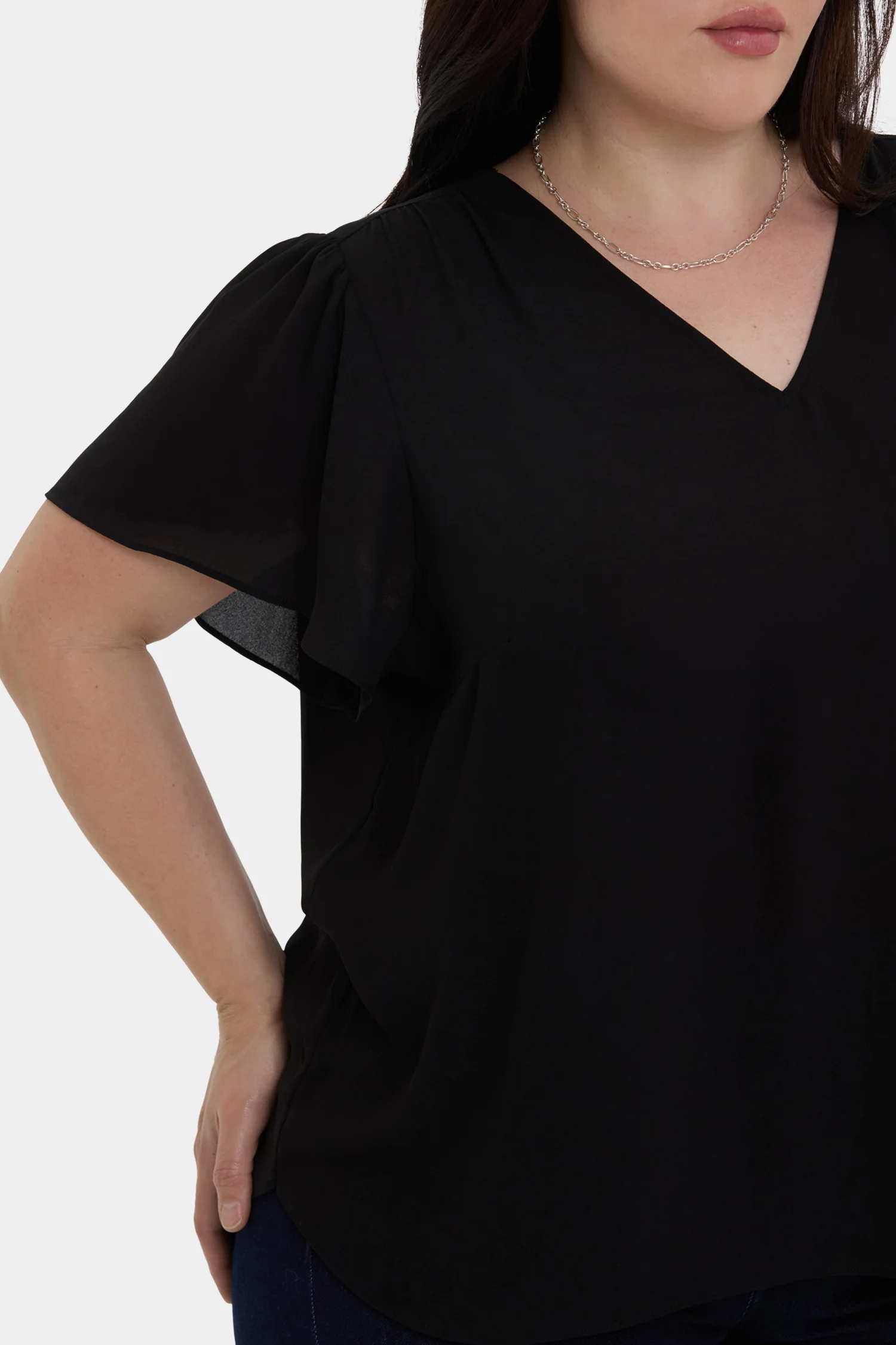 13151-pleated-flutter-sleeved-blouse-in-plus-size-black-1.webp
